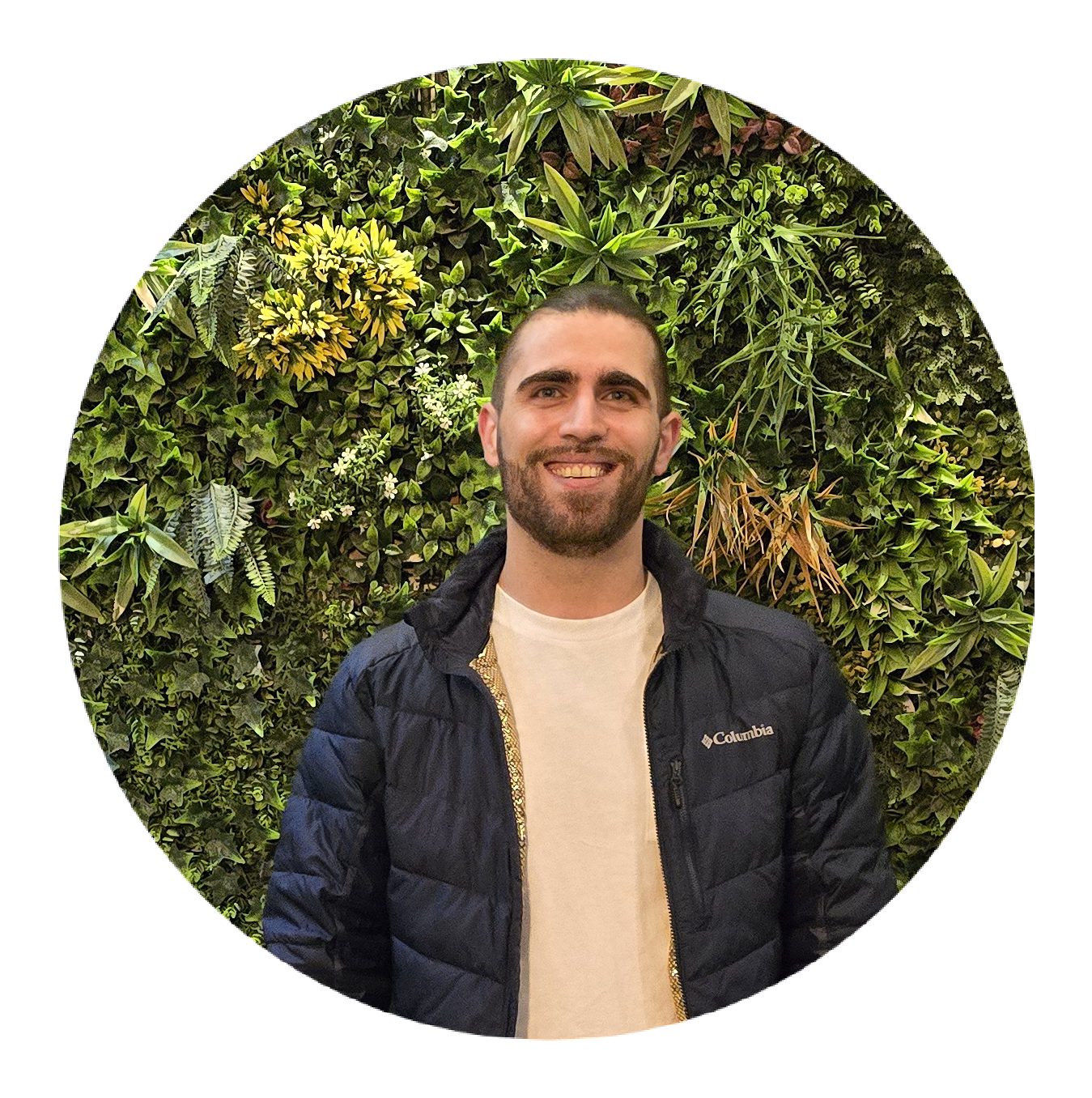 person peeking from behind laptop